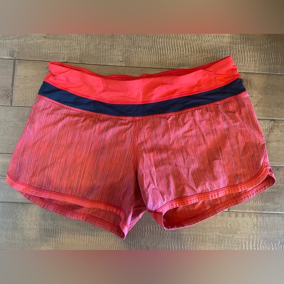 4 pairs of lululemon athletic shorts. - Picture 7 of 13